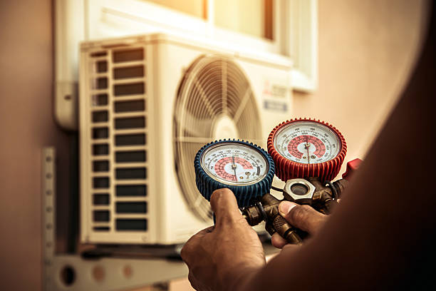 Professional Hvac technician working in Monson, MA